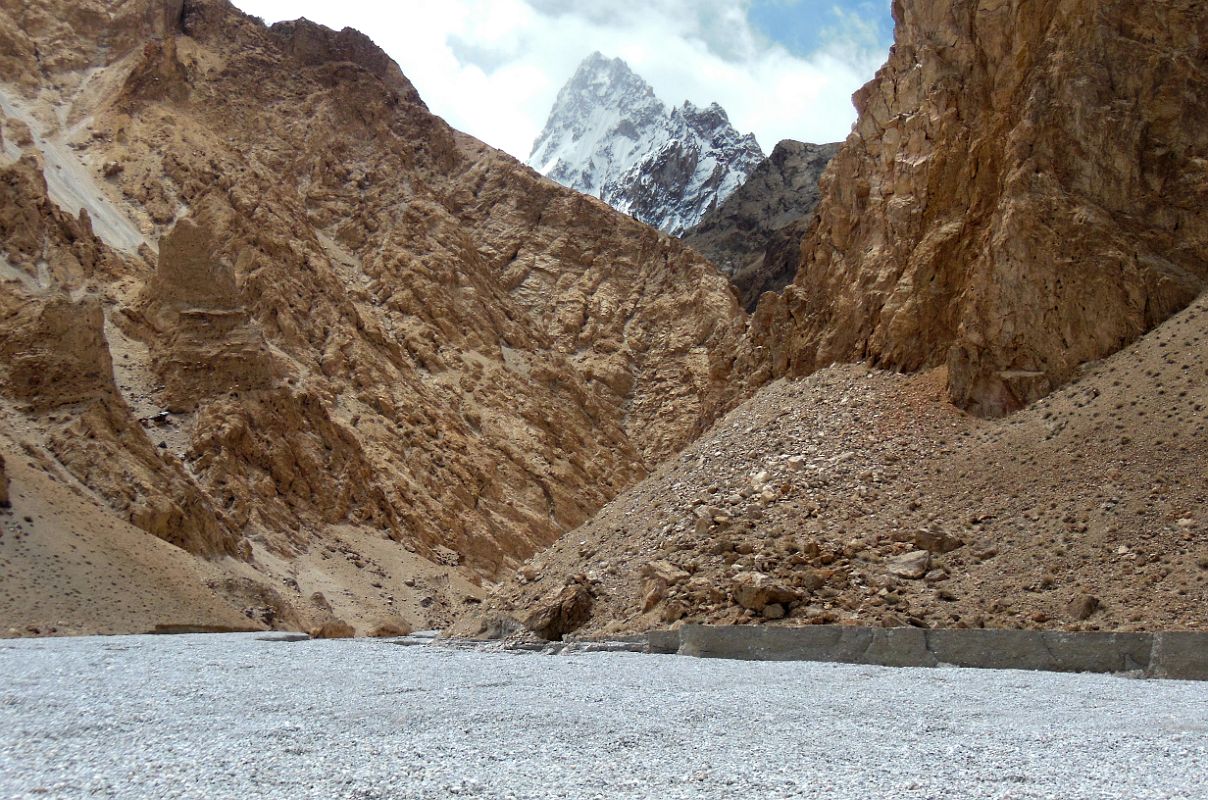 03 Mountain Poking Out Above The Limestone Cliffs In The Shaksgam Valley After Leaving Kerqin Camp On Trek To K2 North Face In China